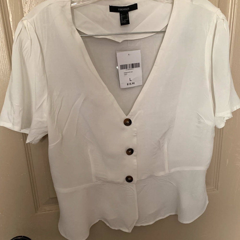 Deep v button peplum top.